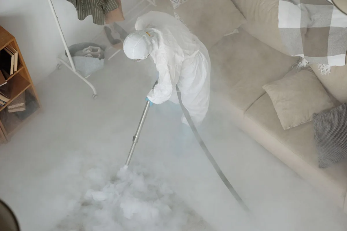 Biohazard cleanup technician in protective equipment, Collinsville, VA